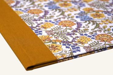 Binder with saffron linen spine